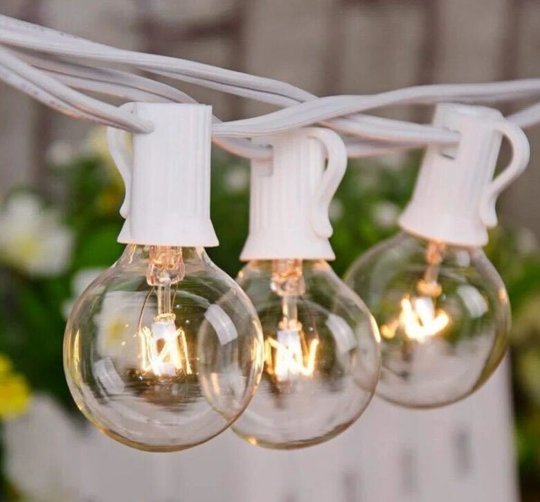 Bulb String Lighting (Cool or Warm White) https://spotlightpartyrental.com/wp-content/uploads/2024/07/stringlights.jpg